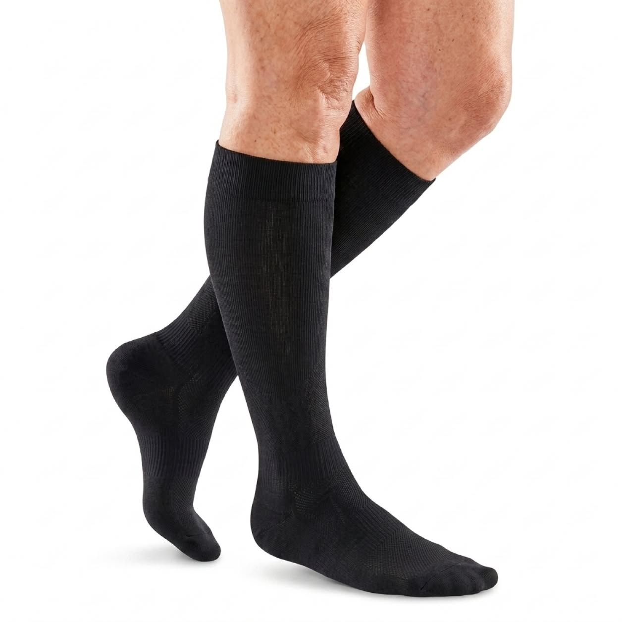 Black TrueFit knee-high compression sock photographed on a white studio background